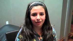 Noelle C - At a year and a half into treatment at Davis Orthodontics